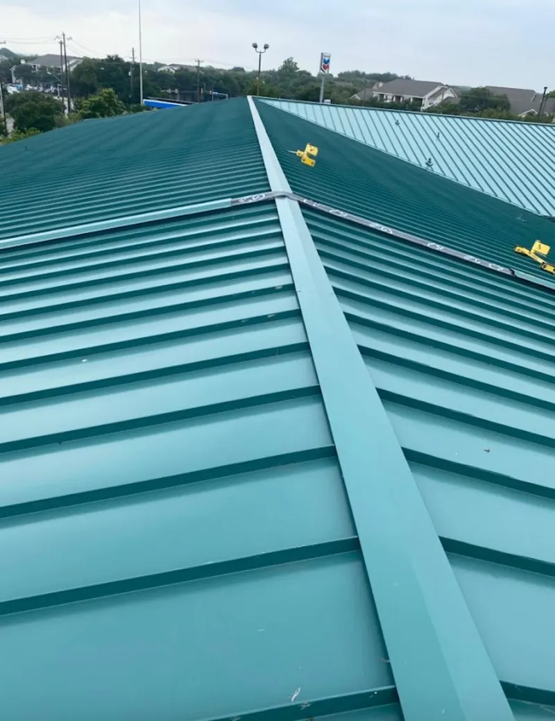 Green commercial metal roof ridge and valley for Metal Roof Repair in Lower Providence